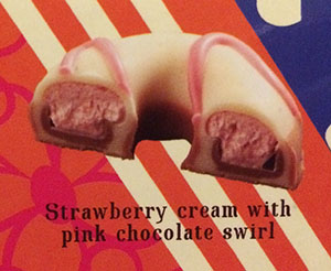 ストロベリークリームの ピンクチョコレートスワールかけ